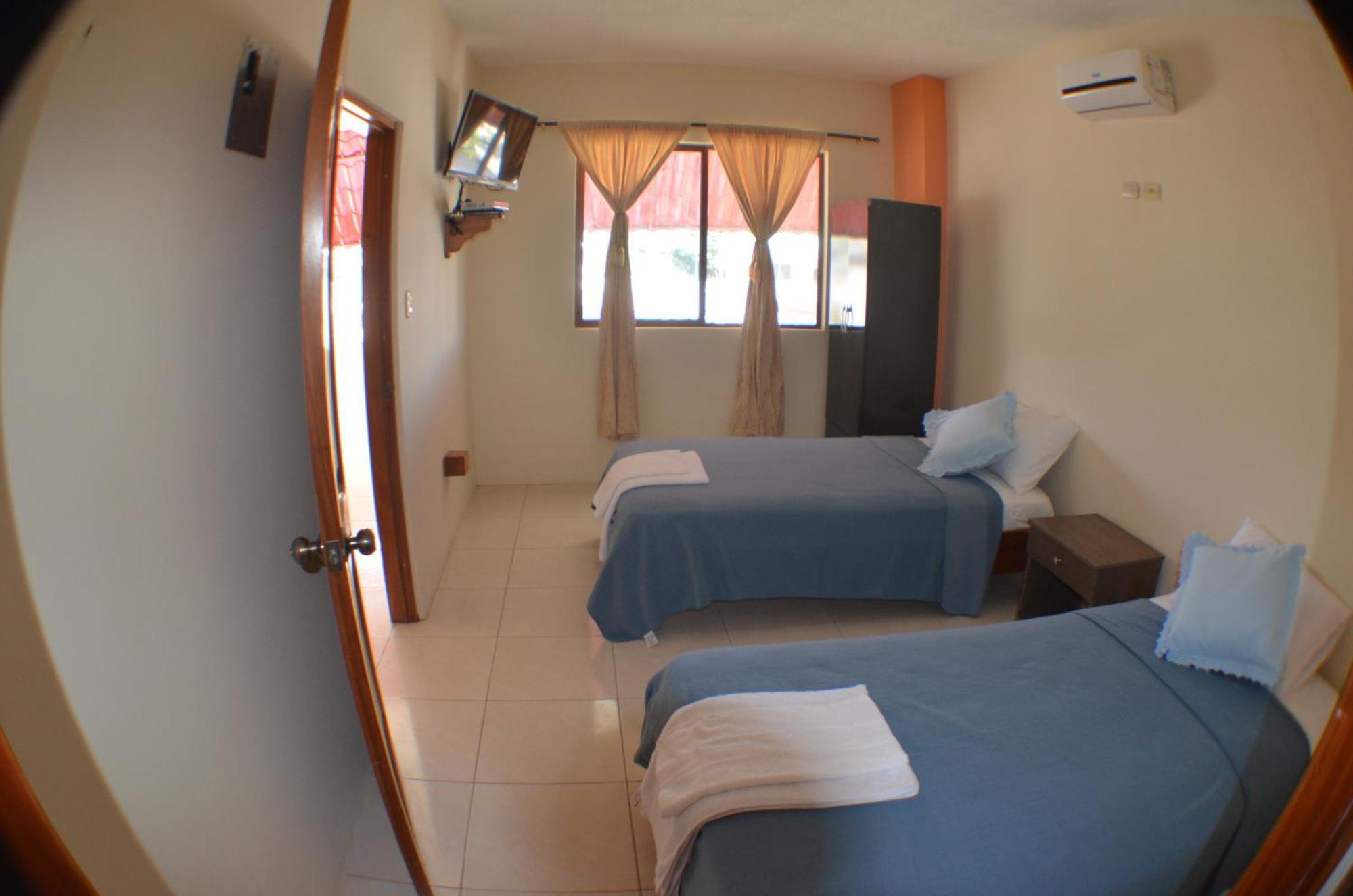 Hostal Tongo Reef Puerto Baquerizo Moreno Habitación foto